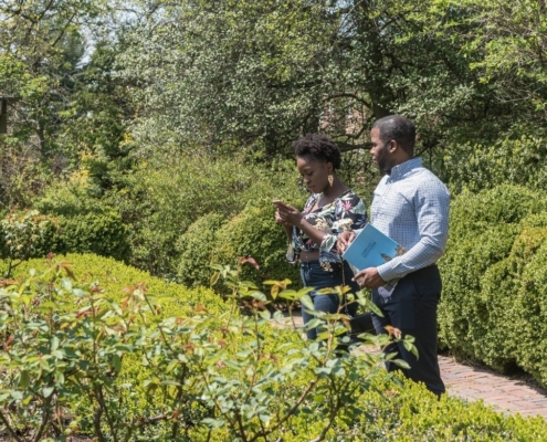 black couple looking at box knot garden