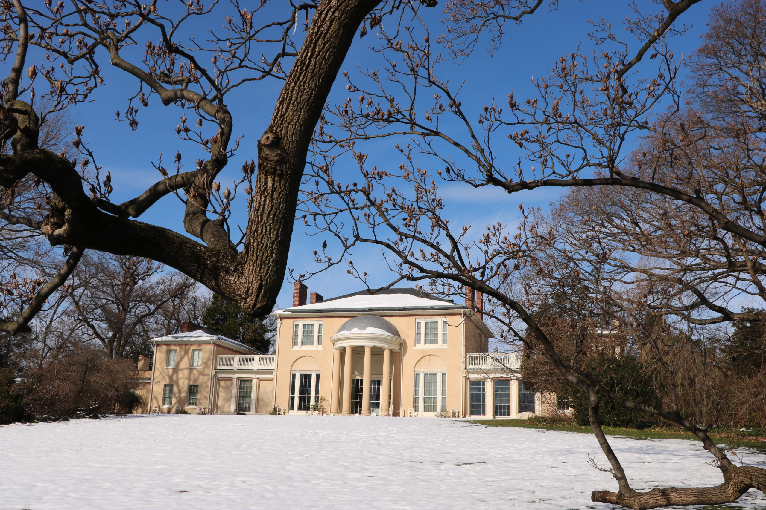 Snowy picture of historic house from south side - Temple Portico included