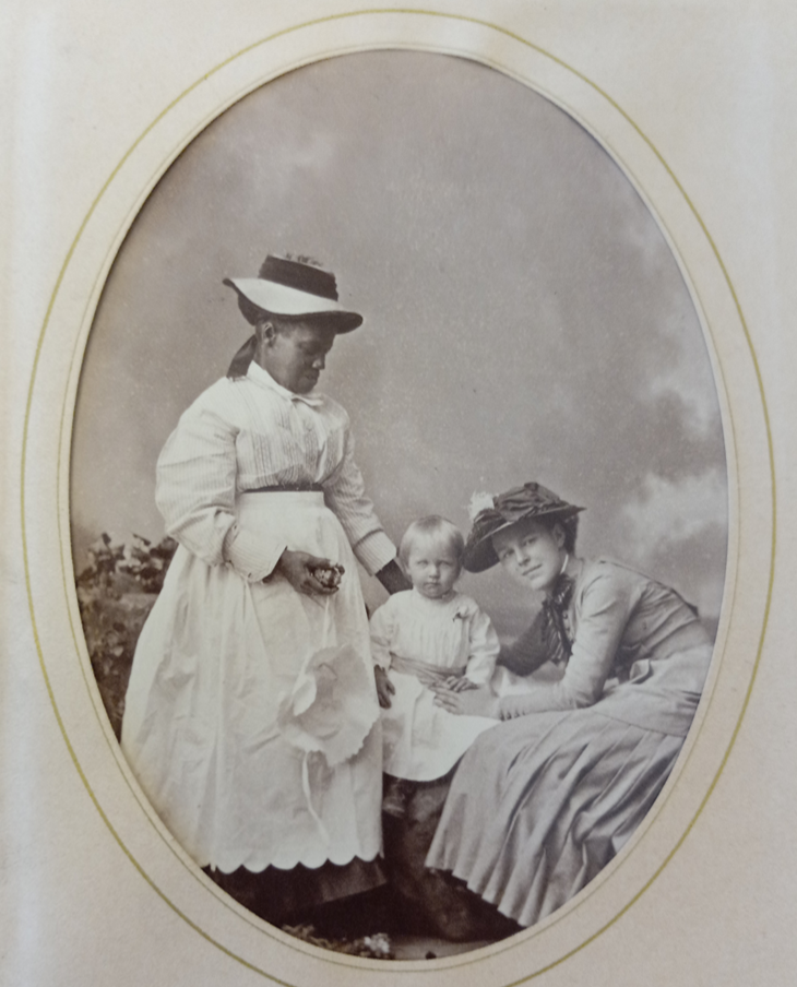 Black woman with small son and mother. PHoto 1882