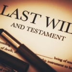 Photo of Last Will and Testament with pen laying over contract